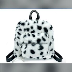 Chic Black and White Spotted Backpack